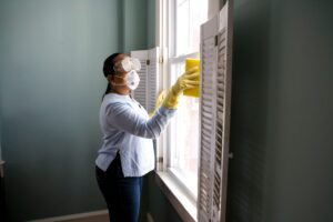 clean window frames using soap and sponge 300x200